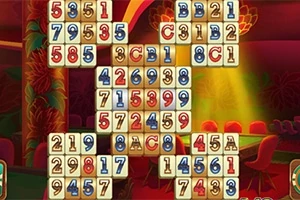 Πλακίδια με αριθμούς και γράμματα σε διάταξη πλέγματος μπροστά από ένα φόντο με κόκκινες και χρυσές αποχρώσεις
