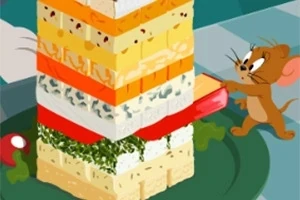 Μια μωβ ποντίκι τραβάει ένα κόκκινο κομμάτι από έναν πύργο τυριού με διάφορα στρώματα σε ένα πράσινο πιάτο